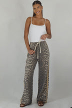 Women's leopard print wide leg jeans with beige racer stripes