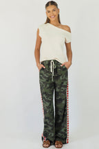 Women's green camouflage wide leg jeans with white stripe and red hearts