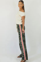 Women's green camouflage wide leg jeans with white stripe and red hearts