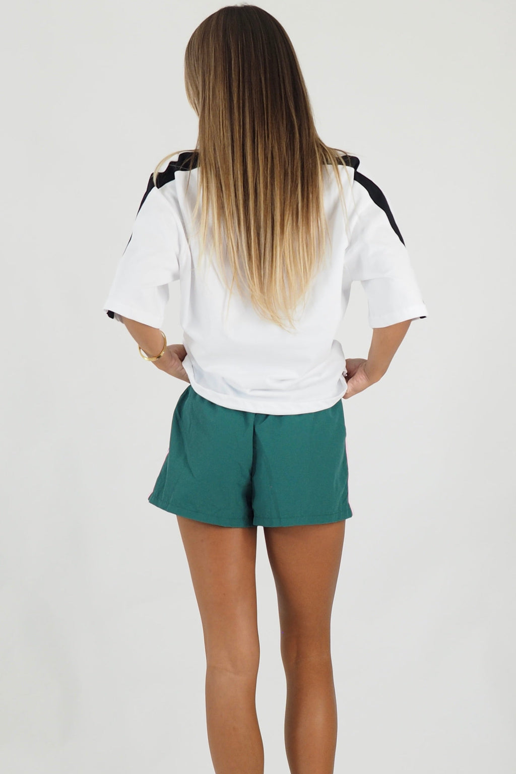 Women's green and pink striped quick dry track shorts