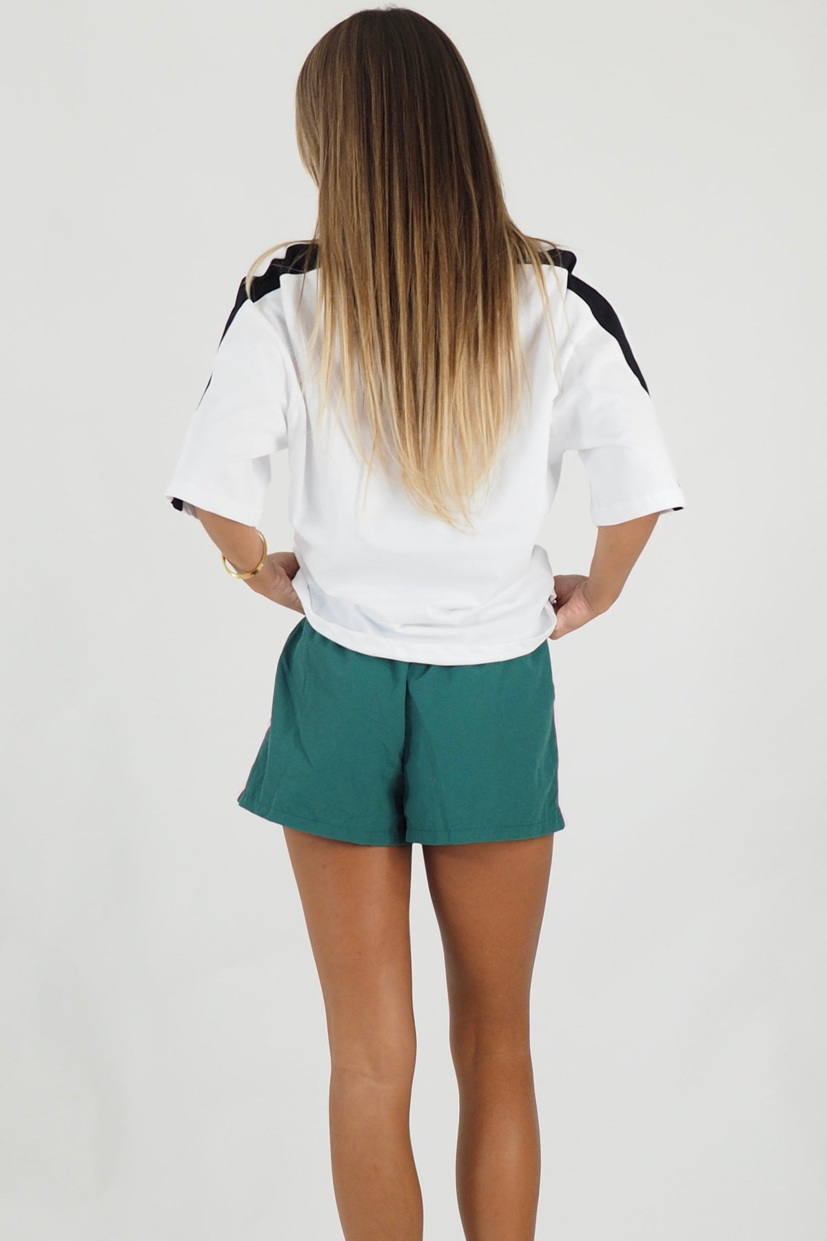 Women's green and pink striped quick dry track shorts