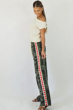 Women's green camouflage wide leg jeans with white stripe and red hearts