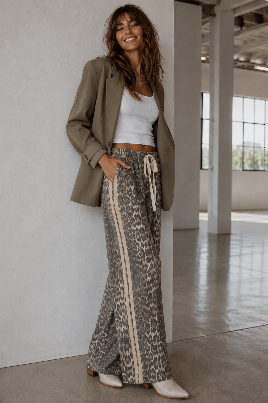 Women's leopard print wide leg jeans with beige racer stripes