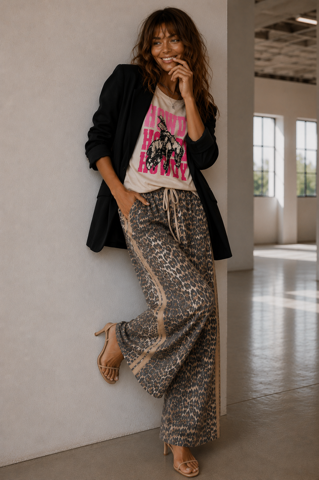 Women's leopard print wide leg jeans with beige racer stripes