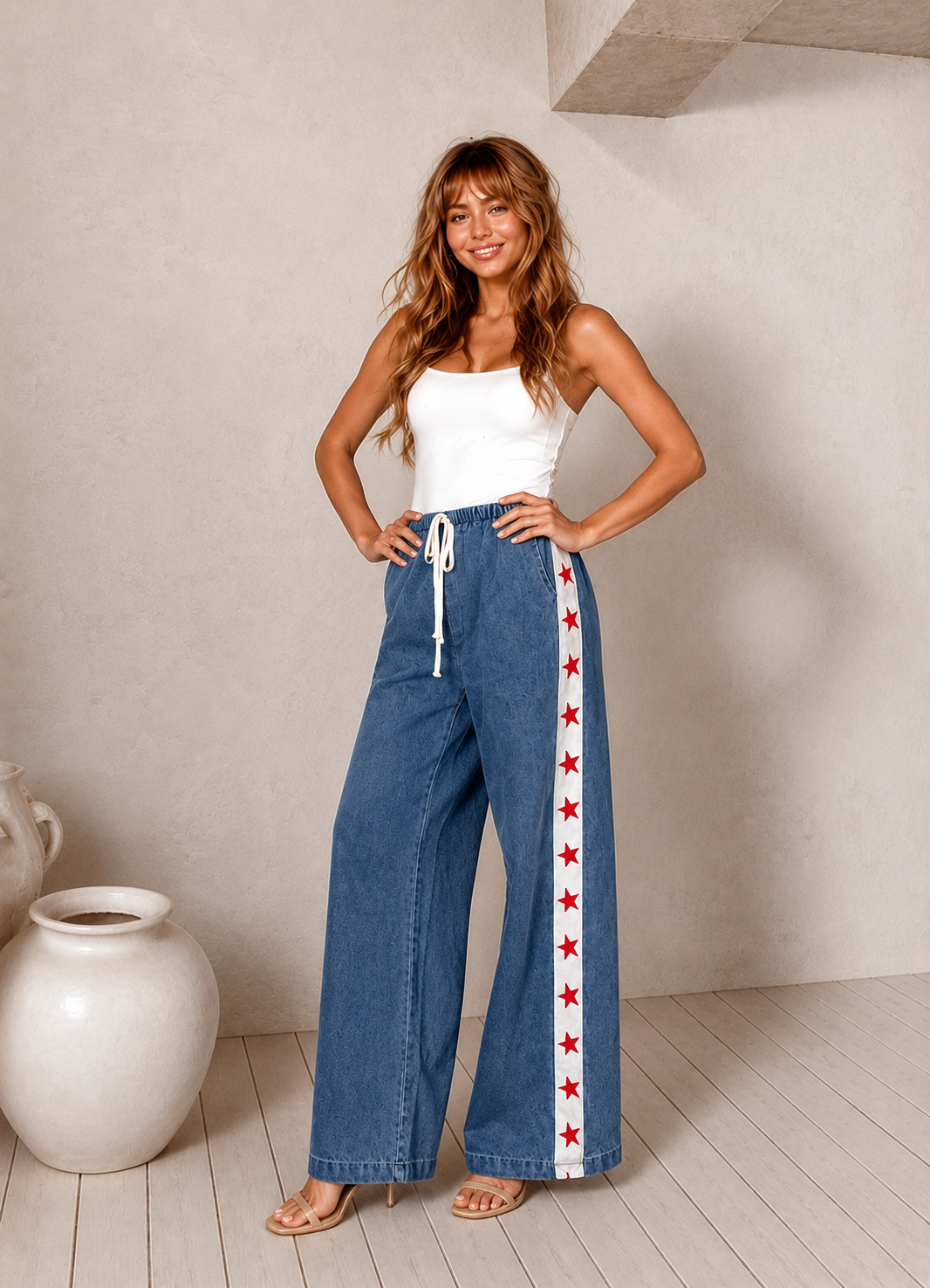 Women's denim wide leg jeans with white racer stripe and red stars
