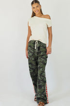 Women's green camouflage wide leg jeans with white stripe and red hearts