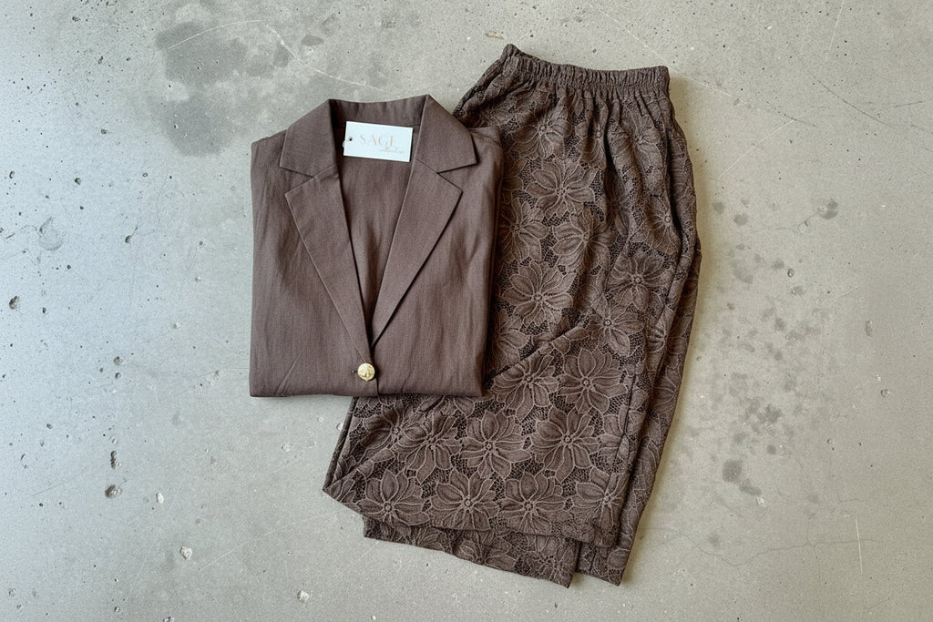 Women's brown two piece set with collared shirt and sheer lace trousers