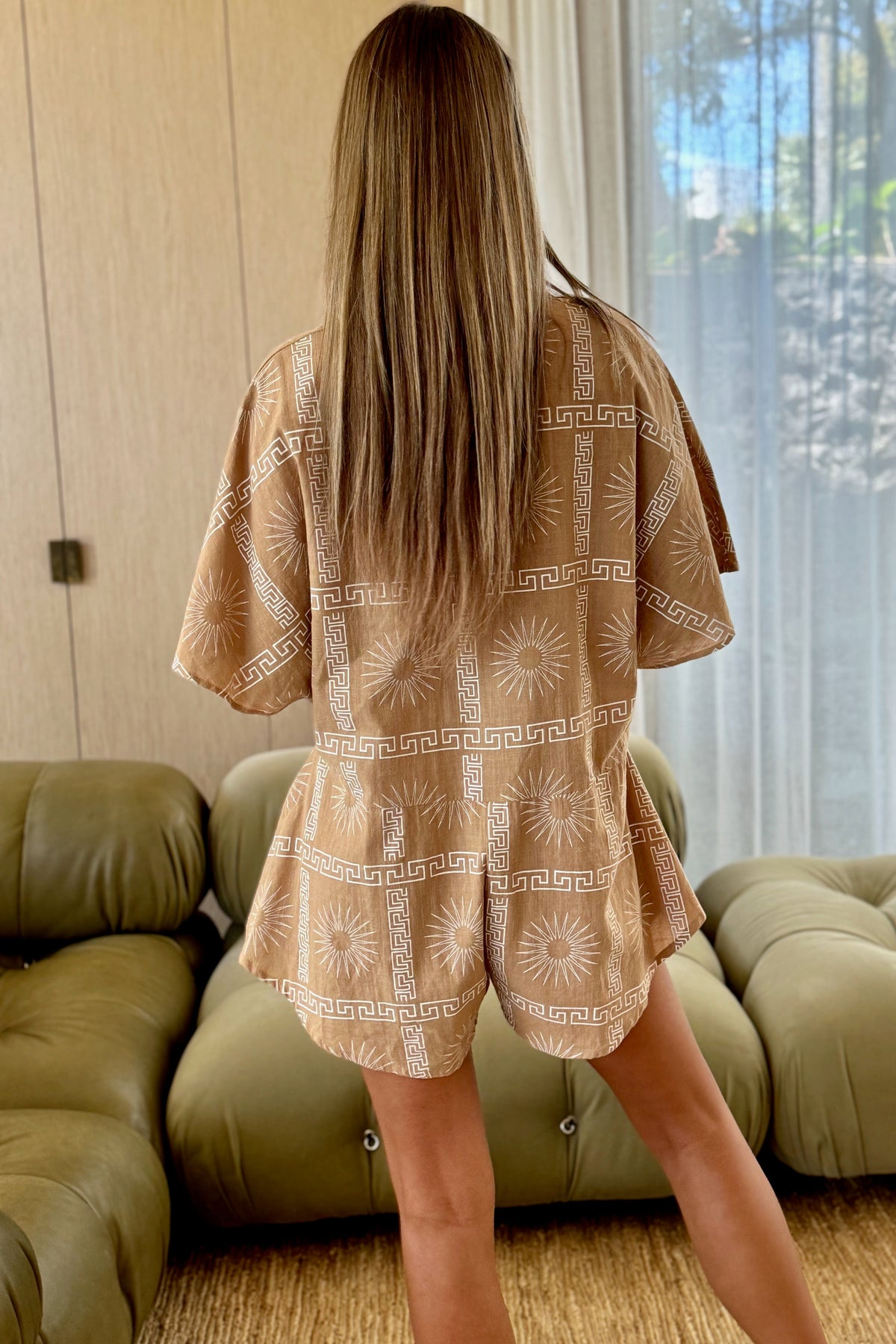 Women's brown cotton playsuit with white abstract sun print