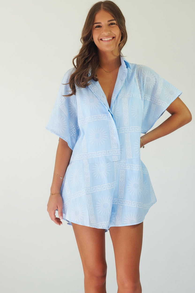 Women's blue cotton playsuit with white abstract sun print