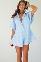 Women's blue cotton playsuit with white abstract sun print