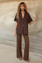Women's brown two piece set with collared shirt and sheer lace trousers