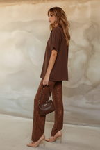 Women's brown two piece set with collared shirt and sheer lace trousers
