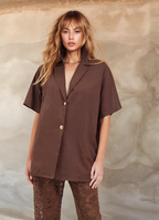 Women's brown two piece set with collared shirt and sheer lace trousers