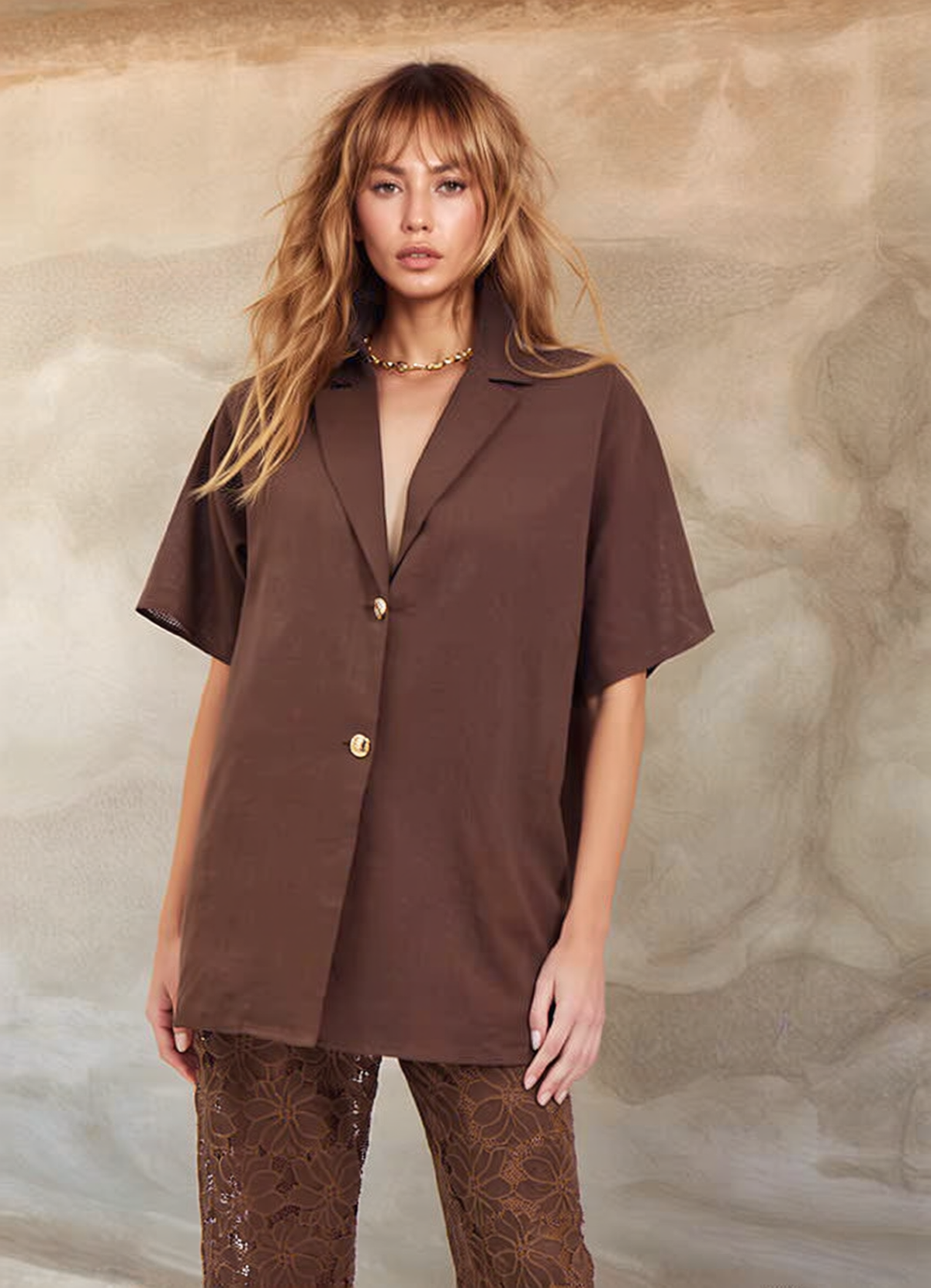 Women's brown two piece set with collared shirt and sheer lace trousers