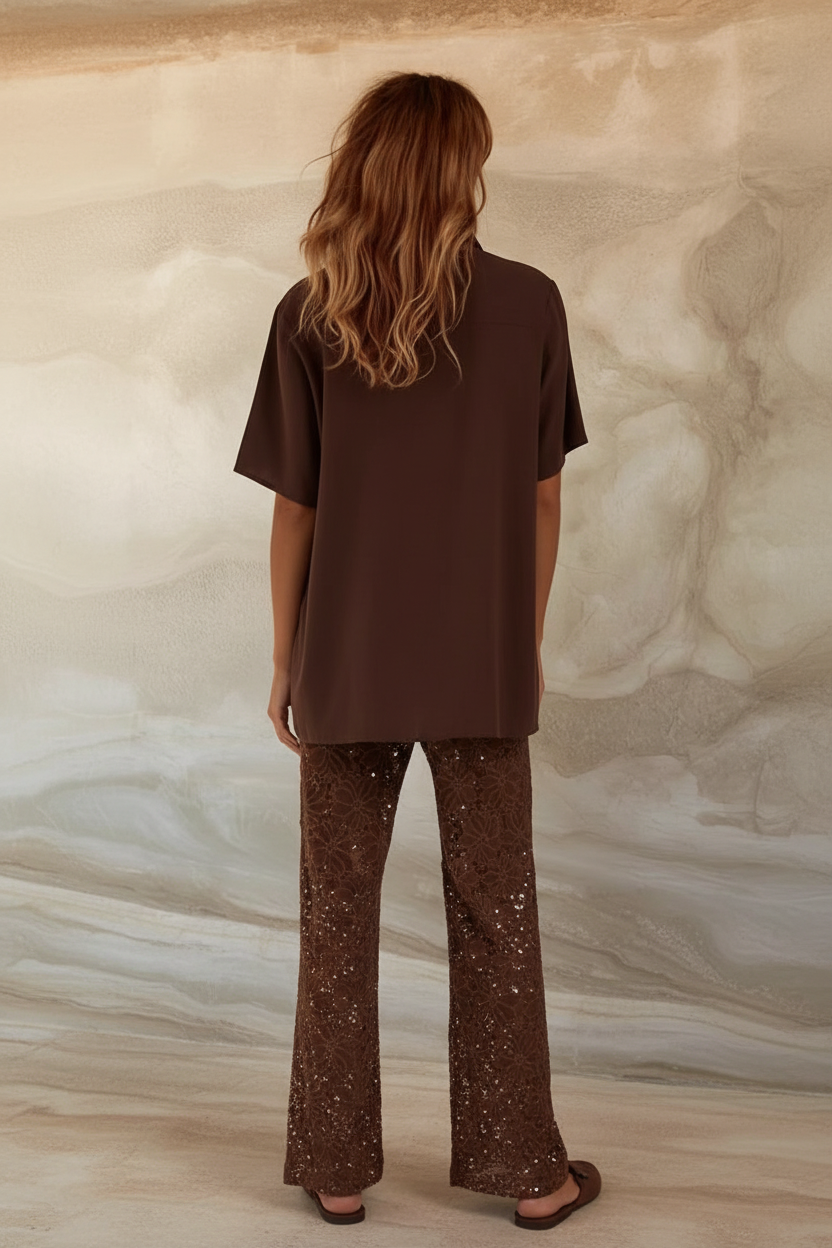 Women's brown two piece set with collared shirt and sheer lace trousers