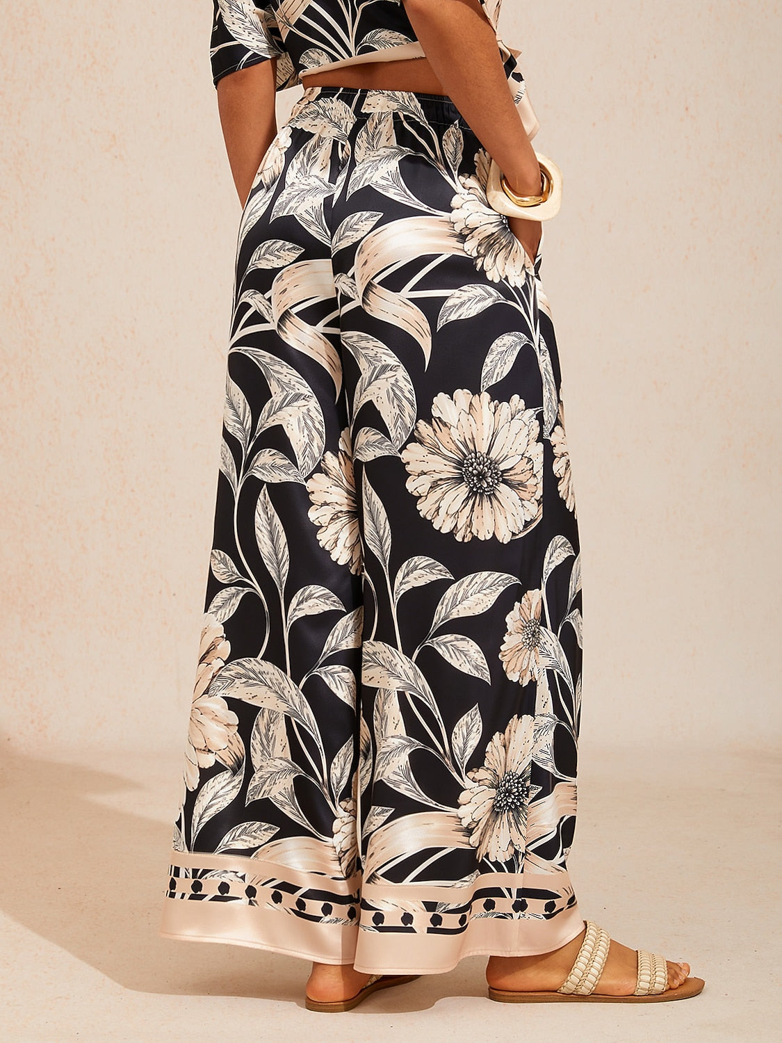 Golden Petal Satin Wide-Leg Pants in Golden Black by Aurelia Sun