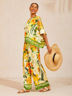 Bell Flower Satin Wide-Leg Pants in Golden Yellow by Aurelia Sun