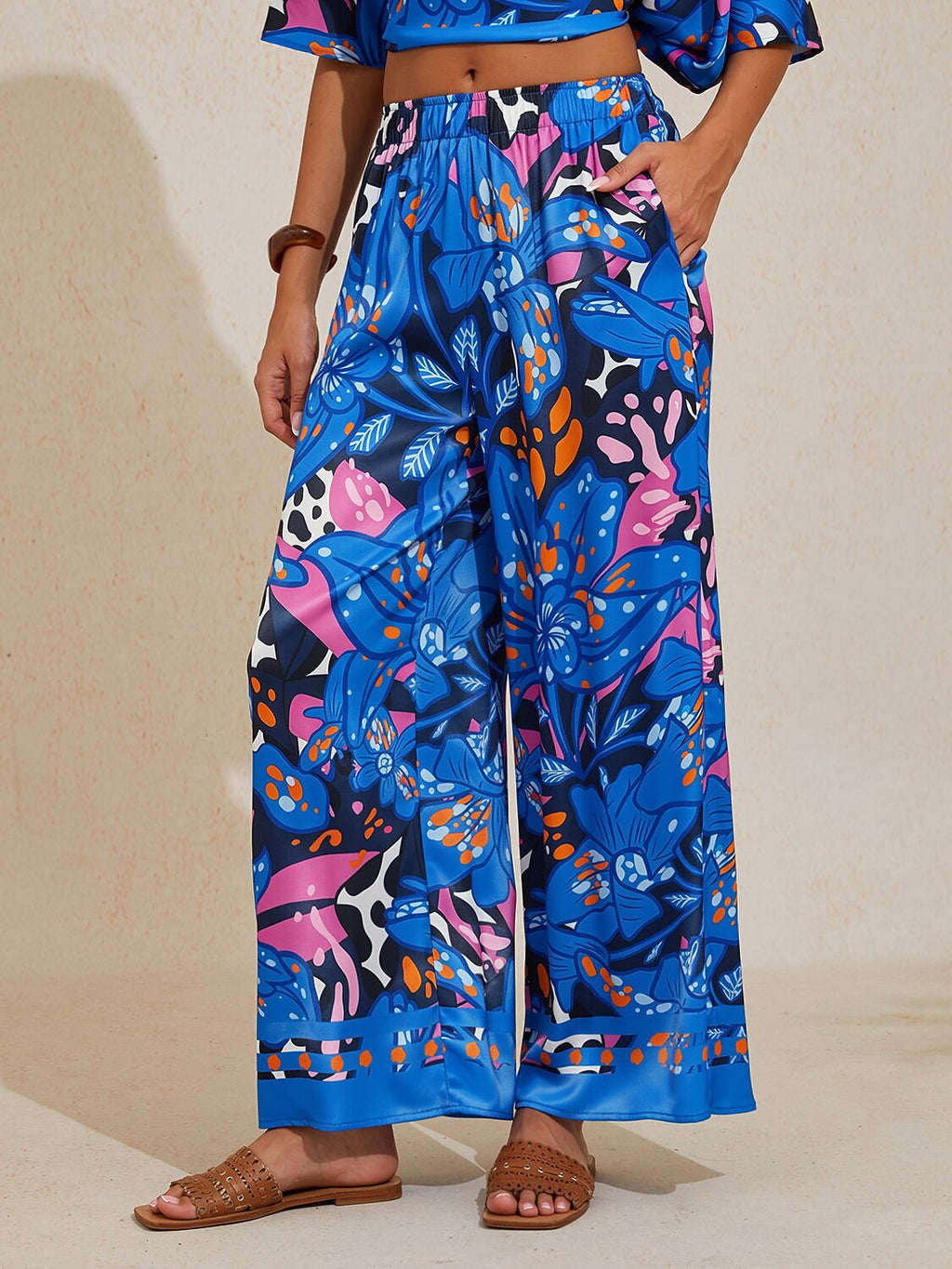 Hibiscus Satin Wide-Leg Pants in Golden Black by Aurelia Sun