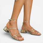 Ebony Metallic Block Heel Sandals in Gold by Aurelia Sun