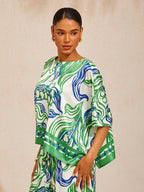 Golden Petal Satin Batwing Top in Glacier Blue by Aurelia Sun