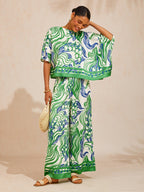 Bell Flower Satin Wide-Leg Pants in Light Green by Aurelia Sun
