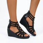 Jeanette Cutout Wedge Sandals in Black by Aurelia Sun