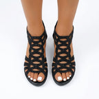 Jeanette Cutout Wedge Sandals in Black by Aurelia Sun
