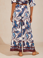 Hibiscus Satin Wide-Leg Pants in Pastel Pink by Aurelia Sun