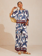 Hibiscus Satin Wide-Leg Pants in Whispy Blue by Aurelia Sun