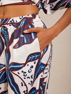 Hibiscus Satin Wide-Leg Pants in Whispy Blue by Aurelia Sun