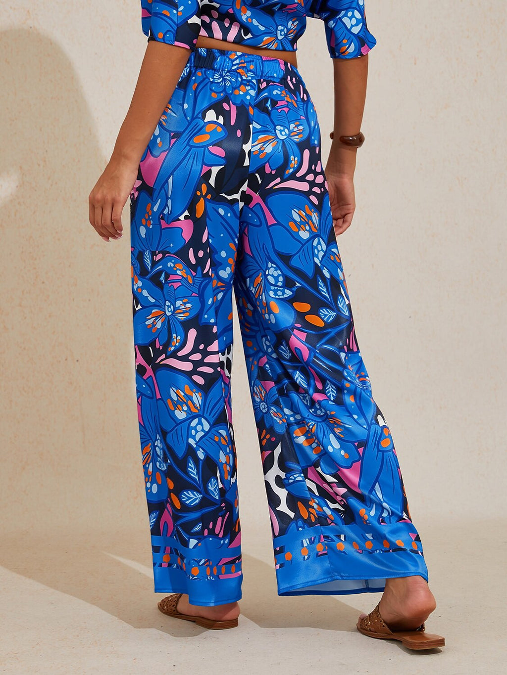 Hibiscus Satin Wide-Leg Pants in Golden Black by Aurelia Sun
