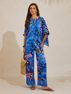 Hibiscus Satin Wide-Leg Pants in Golden Black by Aurelia Sun