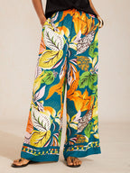 Bell Flower Satin Wide-Leg Pants in Light Yellow by Aurelia Sun
