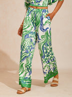 Bell Flower Satin Wide-Leg Pants in Light Green by Aurelia Sun