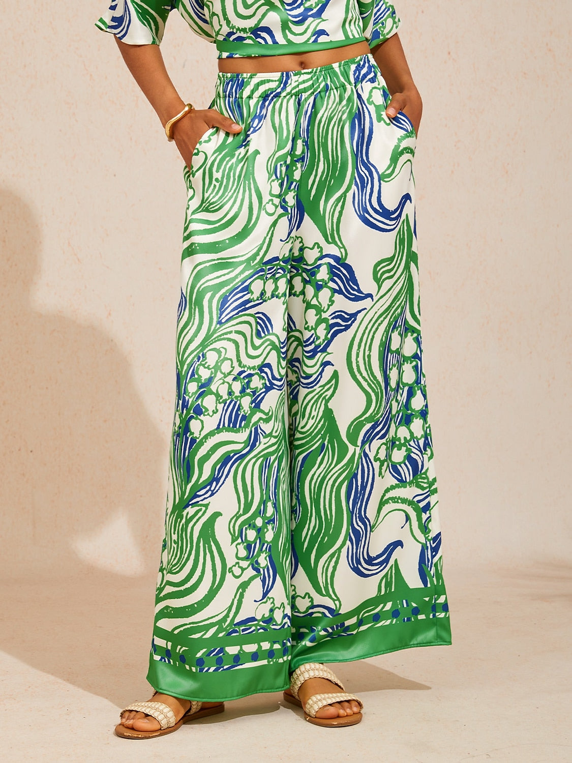 Bell Flower Satin Wide-Leg Pants in Light Green by Aurelia Sun
