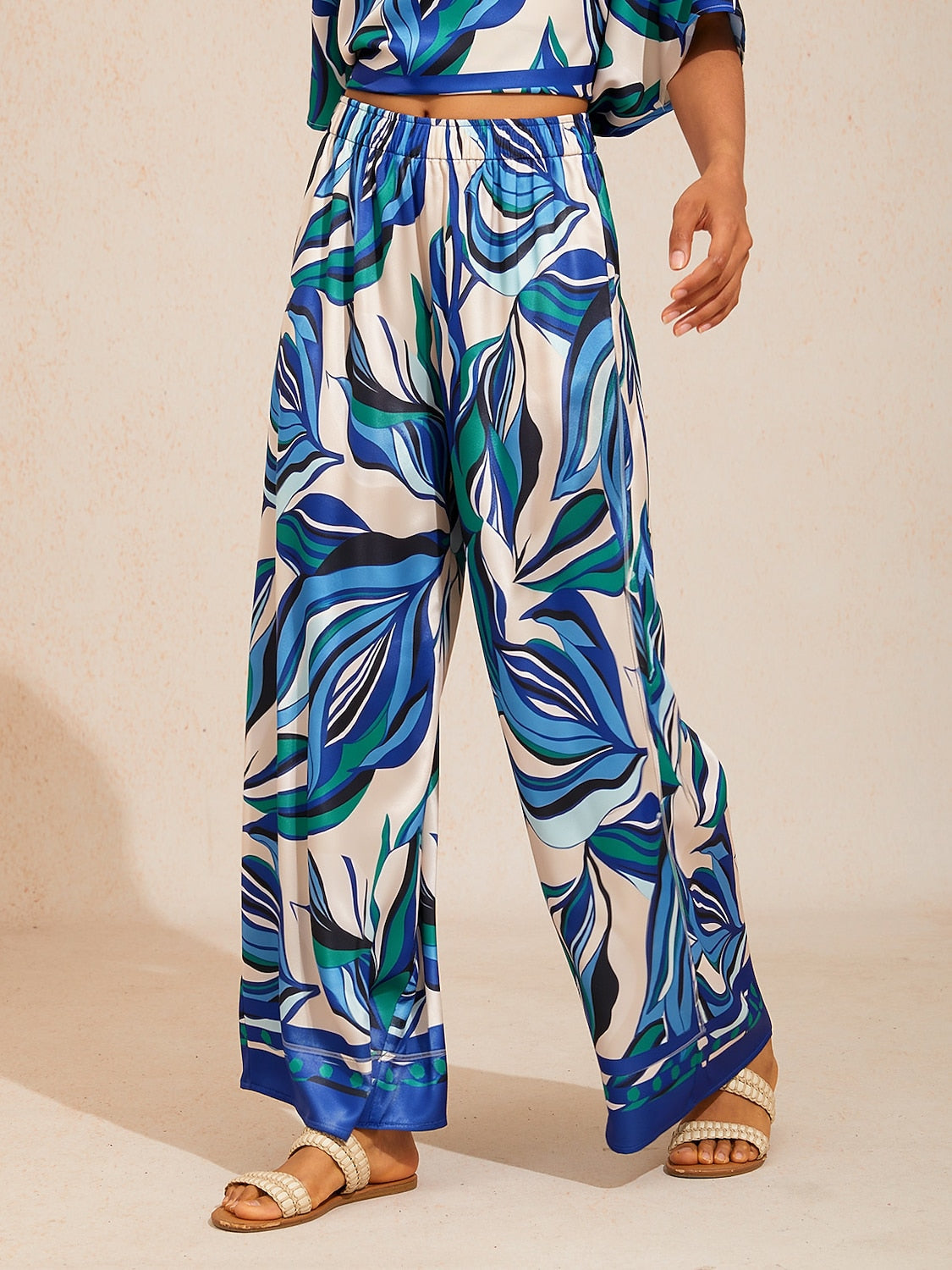 Golden Petal Satin Wide-Leg Pants in Vibrant Orange by Aurelia Sun